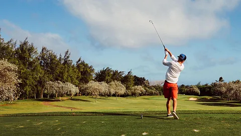 A man on a golf course